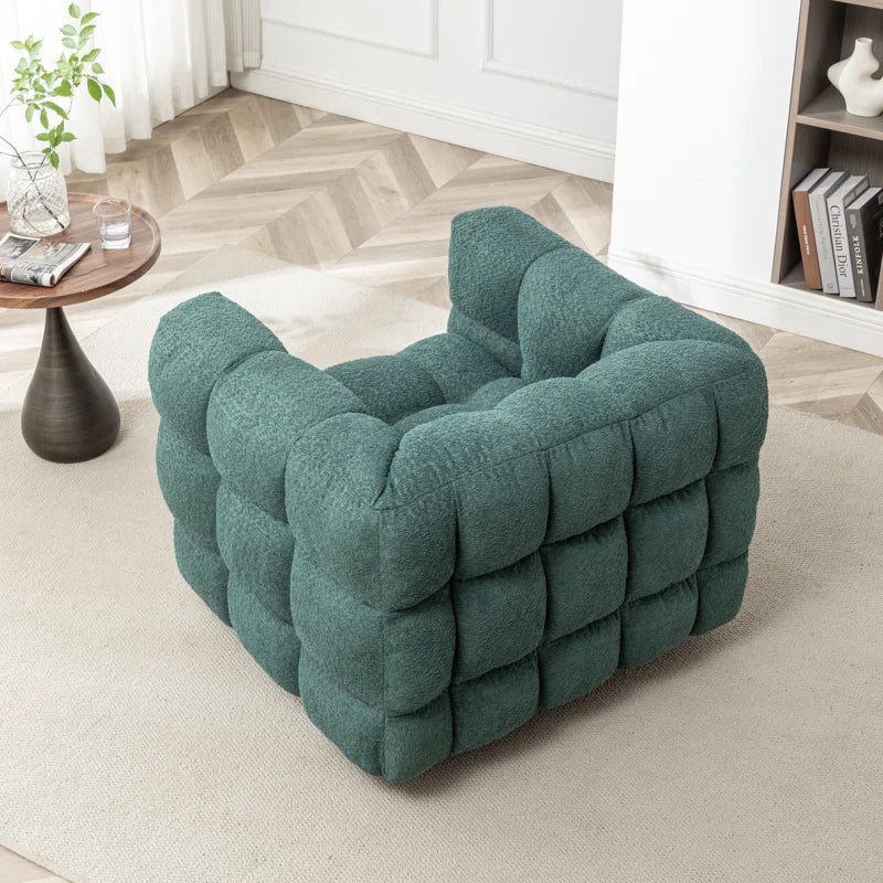 Wade Logan Avdul Upholstered Swivel Armchair